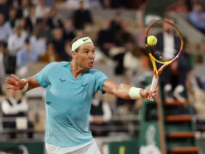 Spain's Rafael Nadal returns the ball against Germany's Alexander Zverev during their first round match of the French Open tennis tournament at the Roland Garros stadium in Paris, Monday, May 27, 2024. (AP Photo/Jean-Francois Badias)