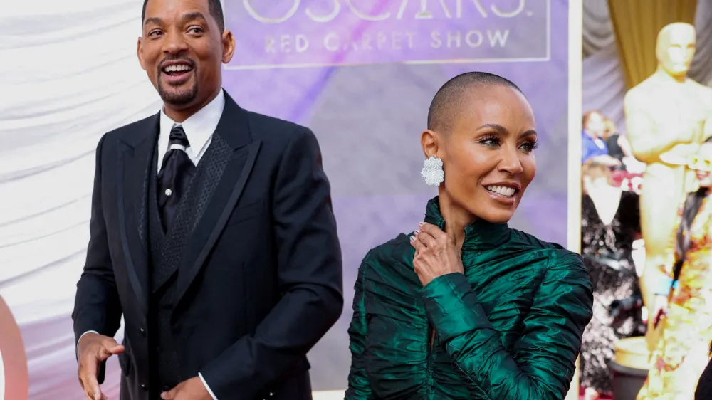 FILE PHOTO: Will Smith and Jada Pinkett Smith pose on the red carpet during the Oscars arrivals at the 94th Academy Awards in Hollywood, Los Angeles, California, U.S., March 27, 2022. REUTERS/Mike Blake/File Photo