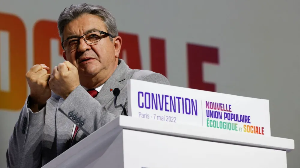 Leader of Far Left opposition party La France Insoumise (LFI) Jean-Luc Melenchon speaks at a convention held by leaders from the newly formed coalition of left-leaning parties as they join forces to campaign for the legislative elections, in Aubervilliers, near Paris, France, May 7, 2022. REUTERS/Rali Benallou NO RESALES. NO ARCHIVES