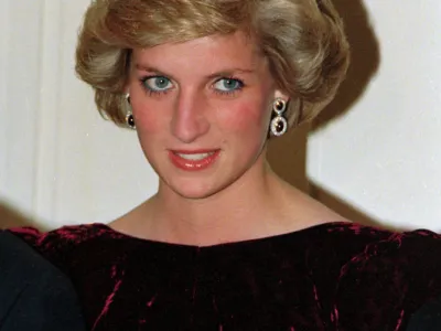 Britain's Princess Diana wears the Spencer tiara as she and Prince Charles attend state dinner at Government House in Adelaide, Austraila, Nov. 7, 1985. (AP Photo/Jim Bourdier)