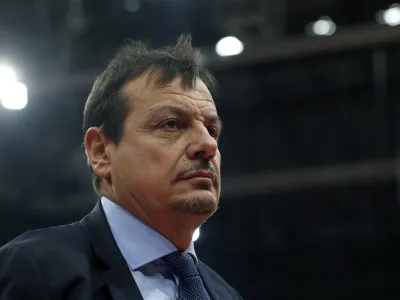 Head coach of Anadolu Efes Ergin Ataman leaves the field after first half of an Euroleague basketball match against Red Star in Belgrade, Serbia, Friday, Jan. 31, 2020. (AP Photo/Darko Vojinovic)