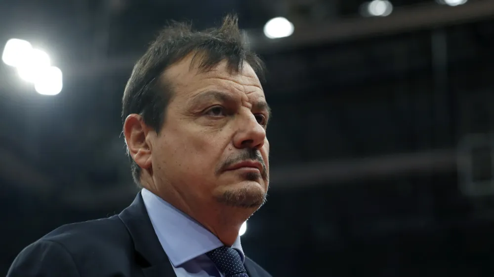 Head coach of Anadolu Efes Ergin Ataman leaves the field after first half of an Euroleague basketball match against Red Star in Belgrade, Serbia, Friday, Jan. 31, 2020. (AP Photo/Darko Vojinovic)