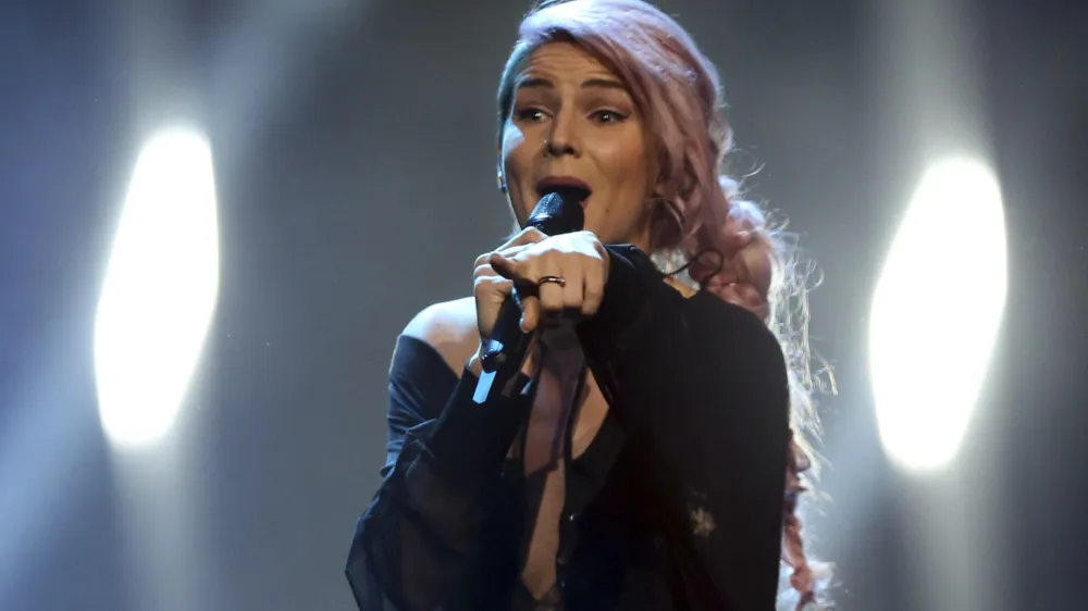 Lea Sirk from Slovenia performs the song 'Hvala, ne!' in Lisbon, Portugal, Saturday, May 12, 2018 during the Eurovision Song Contest grand final. (AP Photo/Armando Franca)