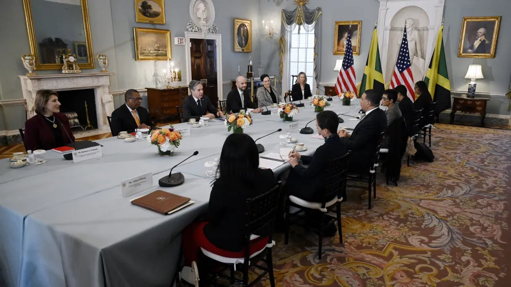 Secretary of State Antony Blinken meets with Jamaica's Prime Minister Andrew Holness at the State Department in Washington, Friday, April 1, 2022. (Olivier Douliery/Pool Photo via AP)