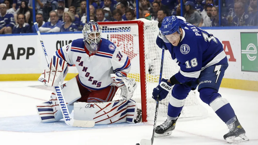 Jun 5, 2022; Tampa, Florida, USA; Tampa Bay Lightning left wing Ondrej Palat (18) skates with the puck as New York Rangers goaltender Igor Shesterkin (31) defends during the third period of the Eastern Conference Final of the 2022 Stanley Cup Playoffs at Amalie Arena. Mandatory Credit: Kim Klement-USA TODAY Sports