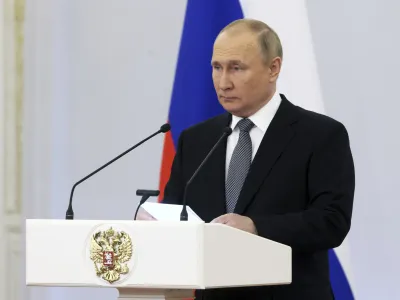 Russian President Vladimir Putin delivers a speech during a meeting with graduates of the country's highest military schools at the Kremlin in Moscow, Russia, Tuesday, June 21, 2022. (Mikhail Metzel, Sputnik, Kremlin Pool Photo via AP)