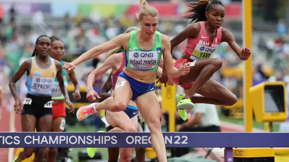 Athletics - World Athletics Championships - Women's 3000 Metres Steeplechase - Heats - Hayward Field, Eugene, Oregon, U.S. - July 16, 2022 Bahrain's Winfred Mutile Yavi and Slovenia's Marusa Mismas Zrimsek in action during the women's 3000 metres steeplechase REUTERS/Lucy Nicholson
