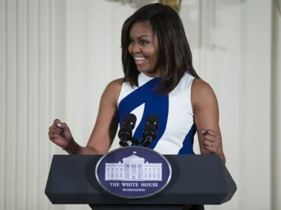 FILE- In this June 1, 2016 file photo, first lady Michelle Obama speaks in the East Room of the White House in Washington. Michelle Obama's "Carpool Karaoke" joyride with James Corden will air Wednesday, July 20, on the late-night host's CBS show. The first lady and Corden sing "This Is For My Girls," described as a "girl power anthem" intended to promote full access to education worldwide. (AP Photo/Evan Vucci, File)