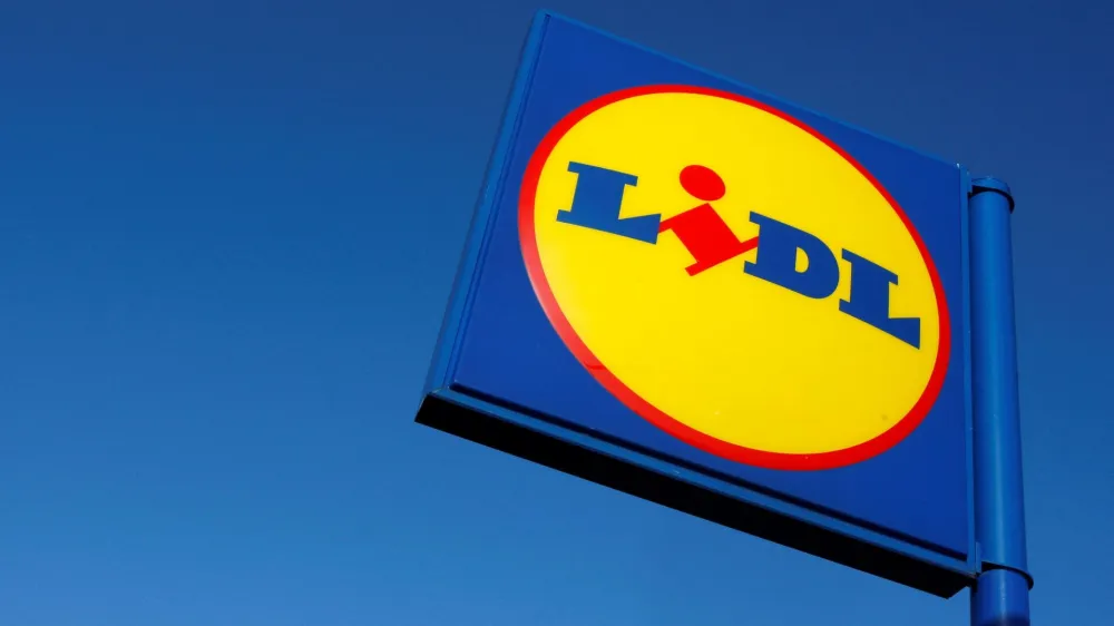 FILE PHOTO: A sign is seen outside a LIDL supermarket in London January 21, 2009. REUTERS/Stephen Hird/File Photo