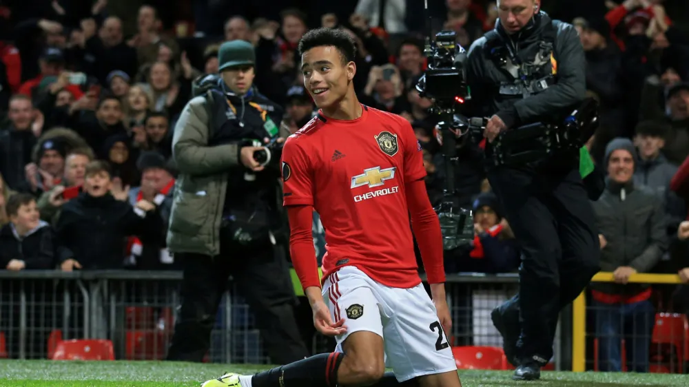 FILE PHOTO: Soccer Football - Europa League - Group L - Manchester United v AZ Alkmaar - Old Trafford, Manchester, Britain - December 12, 2019 Manchester United's Mason Greenwood celebrates scoring their second goal  REUTERS/Jon Super/File Photo
