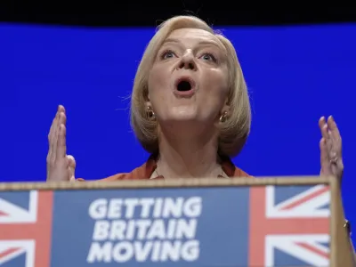 FILE - Britain's Prime Minister Liz Truss makes a speech at the Conservative Party conference at the ICC in Birmingham, England, Wednesday, Oct. 5, 2022. Truss has only been in office for six weeks. But already her libertarian economic policies have triggered a financial crisis, emergency central bank intervention, multiple U-turns and the firing of her Treasury chief. (AP Photo/Kirsty Wigglesworth, File)
