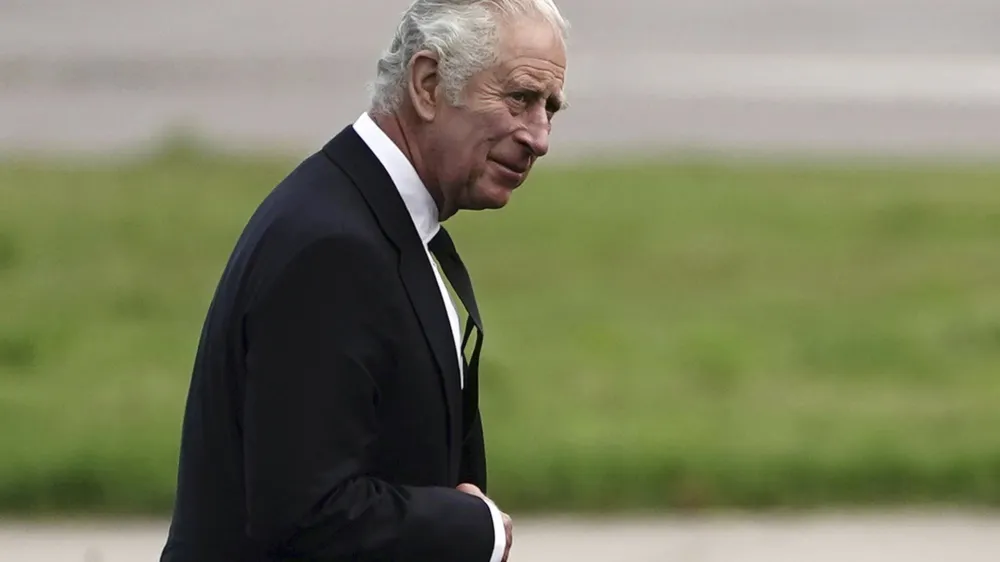 Britain's King Charles III leaves Aberdeen Airport as he travels to London following Thursday's death of Queen Elizabeth II, in Aberdeen, Scotland, Friday Sept. 9, 2022. King Charles III, who spent much of his 73 years preparing for the role, planned to meet with the prime minister and address a nation grieving the only British monarch most of the world had known. He takes the throne in an era of uncertainty for both his country and the monarchy itself. (Aaron Chown/Pool Photo via AP)