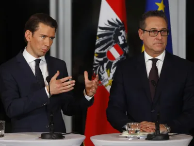 Head of the People's Party (OeVP) Sebastian Kurz (L) and head of the Freedom Party (FPOe) Heinz-Christian Strache address a news conference in Vienna, Austria, December 16, 2017. REUTERS/Leonhard Foeger