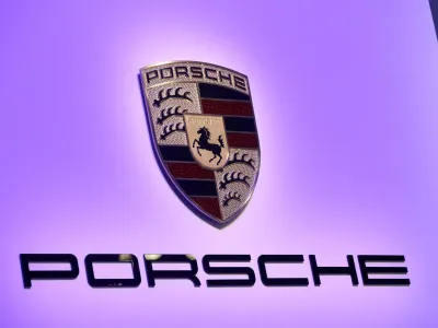 FILE PHOTO: The Porsche logo is seen duering the 2020 Porsche 911 Speedster reveal at the 2019 New York International Auto Show in New York City, New York, U.S, April 17, 2019. REUTERS/Brendan McDermid/File Photo