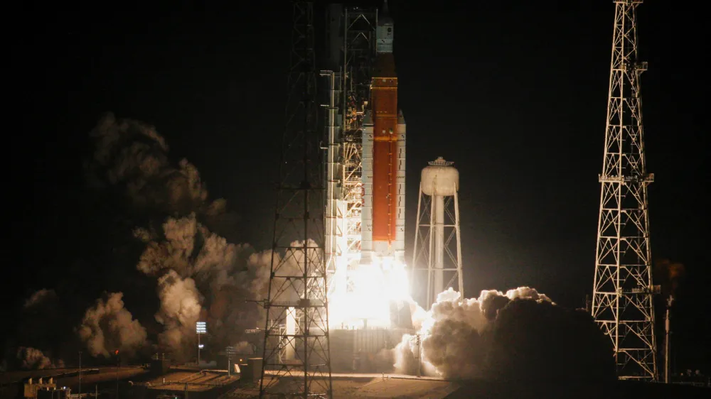 NASA's next-generation moon rocket, the Space Launch System (SLS) rocket with the Orion crew capsule, lifts off from launch complex 39-B on the unmanned Artemis 1 mission to the moon at Cape Canaveral, Florida, U.S. November 16, 2022. REUTERS/Joe Skipper