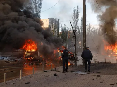 Cars are seen on fire after Russian missile strikes, as Russia's attack continues, in Kyiv, Ukraine October 10, 2022. REUTERS/Valentyn Ogirenko