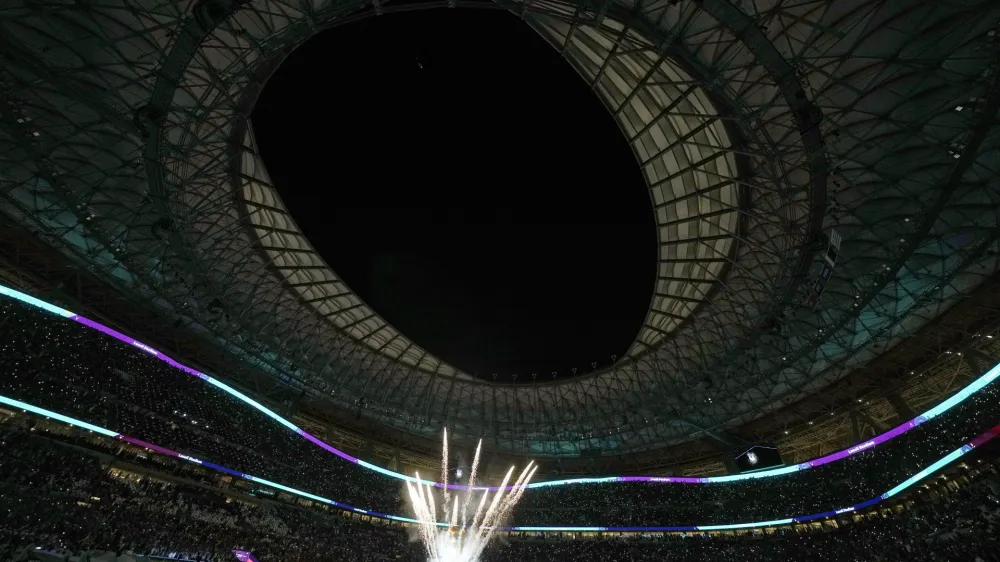 Artists perform ahead the World Cup group H soccer match between Portugal and Uruguay, at the Lusail Stadium in Lusail, Qatar, Monday, Nov. 28, 2022. (AP Photo/Themba Hadebe)