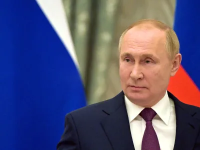 FILE PHOTO: Russian President Vladimir Putin attends a joint news conference with German Chancellor Olaf Scholz in Moscow, Russia February 15, 2022. Sputnik/Sergey Guneev/Kremlin via REUTERS/File Photo