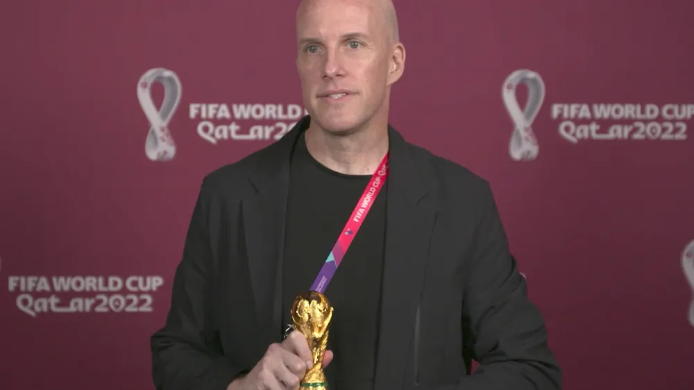 A screenshot taken from video provided by FIFA of journalist Grant Wahl at an awards ceremony in Doha, Qatar in Nov. 2022. Wahl, one of the most well-known soccer writers in the United States, died early Saturday Dec. 10, 2022 while covering the World Cup match between Argentina and the Netherlands. (FIFA via AP)