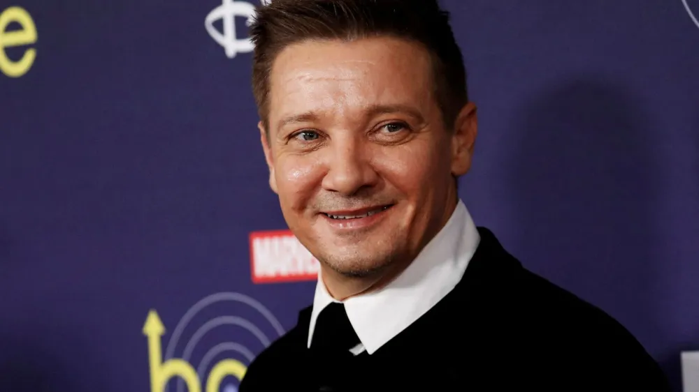 FILE PHOTO: Actor Jeremy Renner poses for a picture during the premiere of the television series Hawkeye at El Capitan theatre in Los Angeles, California, U.S. November, 17, 2021. REUTERS/Mario Anzuoni/File Photo
