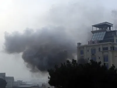 Smoke rises from a hotel building after an explosions and gunfire in the city of Kabul, Afghanistan, Monday, Dec. 12, 2022. A Taliban official says that a hotel building has come under a complex attack in the Afghan capital Kabul. (AP Photo)