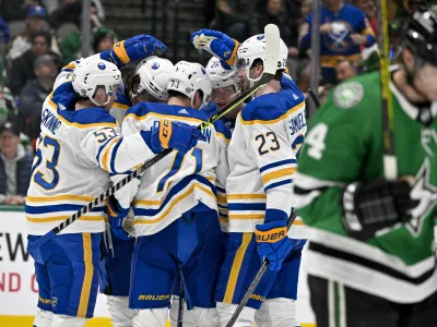 Jan 23, 2023; Dallas, Texas, USA; Buffalo Sabres left wing Jeff Skinner (53) and left wing Victor Olofsson (71) and defenseman Mattias Samuelsson (23) and defenseman Rasmus Dahlin (26) celebrates a goal scored by Olofsson against the Dallas Stars during the third period at the American Airlines Center. Mandatory Credit: Jerome Miron-USA TODAY Sports