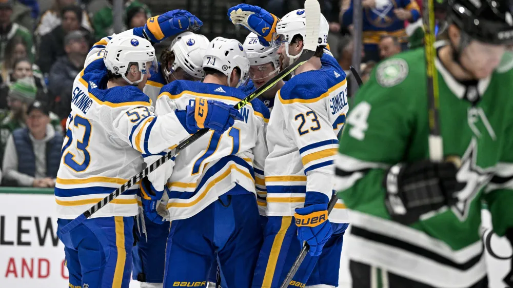 Jan 23, 2023; Dallas, Texas, USA; Buffalo Sabres left wing Jeff Skinner (53) and left wing Victor Olofsson (71) and defenseman Mattias Samuelsson (23) and defenseman Rasmus Dahlin (26) celebrates a goal scored by Olofsson against the Dallas Stars during the third period at the American Airlines Center. Mandatory Credit: Jerome Miron-USA TODAY Sports