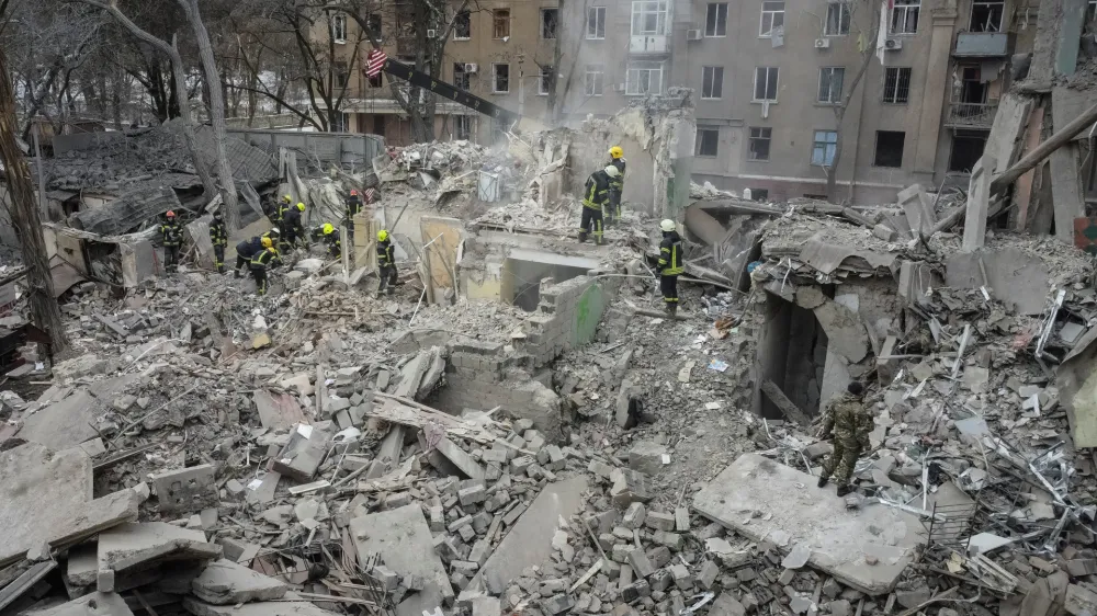 Rescuers work at a site of a residential building destroyed by a Russian missile strike, amid Russia's attack on Ukraine, in Kramatorsk, Ukraine February 2, 2023. REUTERS/Vitalii Hnidyi