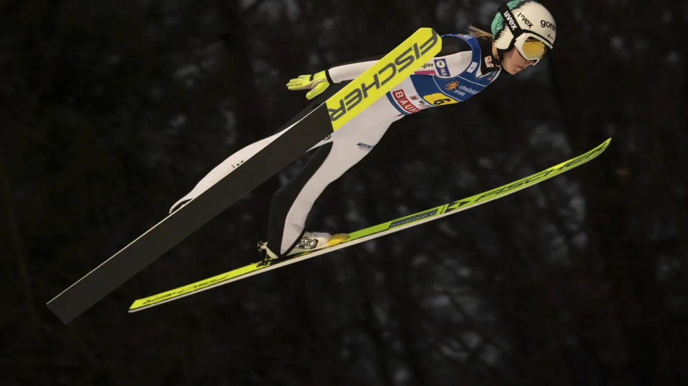 Slovenia's Ema Klinec in action during the World Cup, large hill, team jumping mixed in Willingen, Germany, Friday Feb. 3 2023. (Swen Pfortner/dpa via AP)