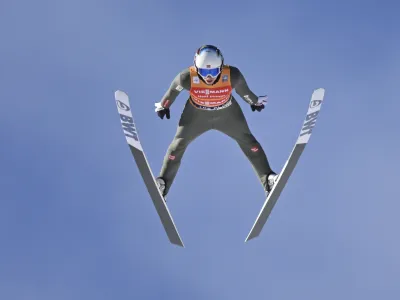 Halvor Egner Granerud, of Norway, soars through the air during his second round jump in the men's World Cup large hill ski jumping competition on Saturday, Feb. 11, 2023, in Lake Placid, N.Y. (AP Photo/Hans Pennink)