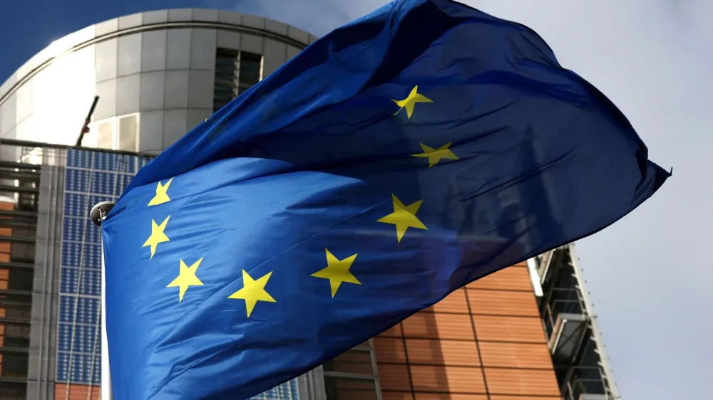 FILE PHOTO: A European Union flag flutters outside the EU Commission headquarters, in Brussels, Belgium, February 1, 2023 REUTERS/Yves Herman/File Photo