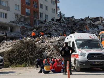 Rescuers work at the site of a collapsed building, in the aftermath of the deadly earthquake, in Antakya, Turkey February 18, 2023. REUTERS/Maxim Shemetov