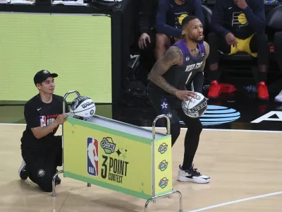 Damian Lillard of the Portland Trail Blazers shoots during the three-point contest at the NBA basketball All-Star weekend Saturday, Feb. 18, 2023, in Salt Lake City. (AP Photo/Rob Gray)