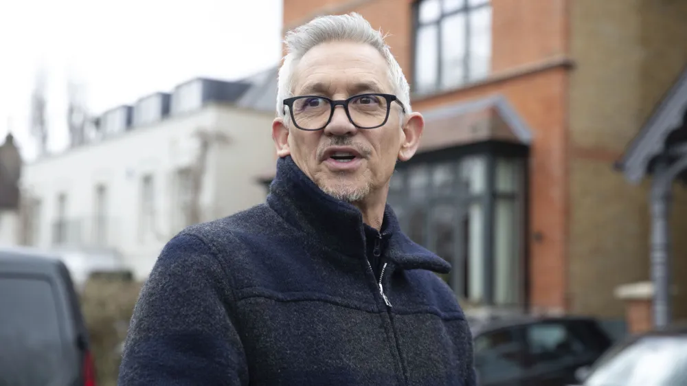 FILE - Match Of The Day host Gary Lineker outside his home in London, Sunday March 12, 2023. Lineker will return to airwaves after the BBC reversed the former soccer great's suspension on Monday, March 13, 2023 following a post on Twitter that had criticized the British government's new asylum policy. (Lucy North/PA via AP, File)