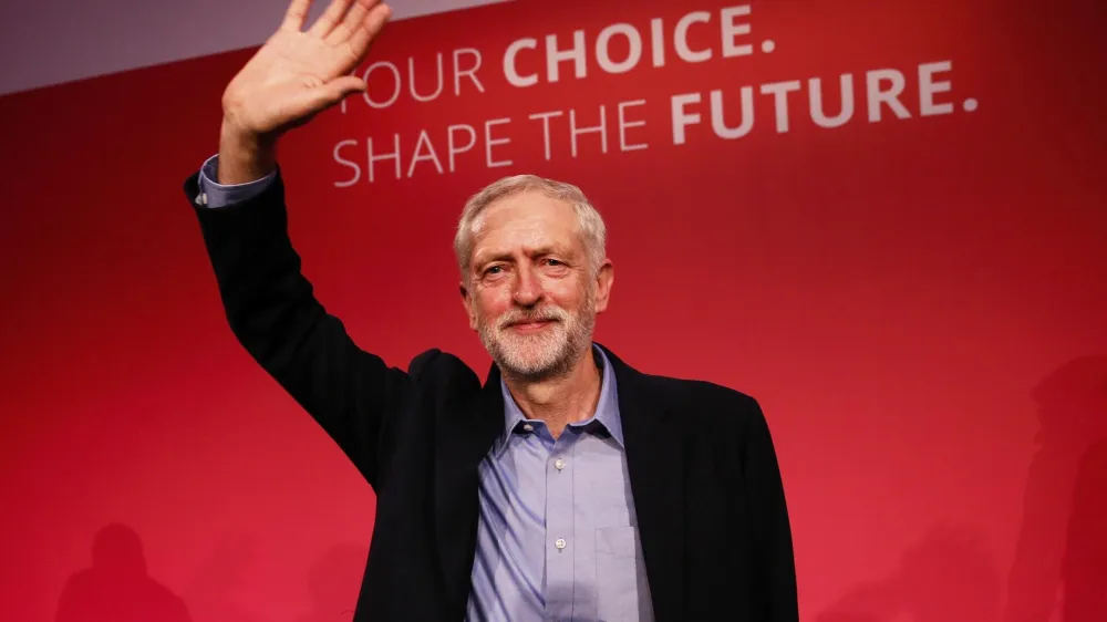 The new leader of Britain's opposition Labour Party Jeremy Corbyn waves after making his inaugural speech at the Queen Elizabeth Centre in central London, September 12, 2015. Avowed socialist and Karl Marx admirer Jeremy Corbyn was elected leader of Britain's opposition Labour party on Saturday, a result that may make a British EU exit more likely and which senior figures have said would leave their party unelectable. REUTERS/Stefan Wermuth