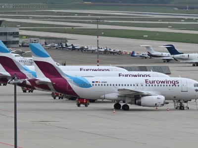 FILED - 06 October 2022, Stuttgart: Aircraft's of Eurowings airline are seen parked on the apron of the airport in Stuttgart. Photo: Bernd Wei&szlig;brod/dpa