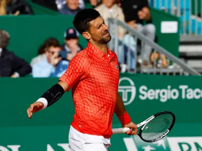 FILE PHOTO: Tennis - ATP Masters 1000 - Monte Carlo Masters - Monte-Carlo Country Club, Roquebrune-Cap-Martin, France - April 13, 2023 Serbia's Novak Djokovic reacts during his round of 16 match against Italy's Lorenzo Musetti REUTERS/Eric Gaillard/File Photo