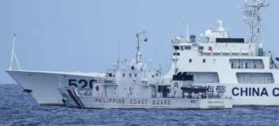 A Chinese Coast Guard ship with bow number 5201 blocks Philippine Coast Guard ship BRP Malapascua as it maneuvers to enter the mouth of the Second Thomas Shoal locally known as Ayungin Shoal at the South China Sea on Sunday, April 23, 2023. The near-collision was among the tense confrontations encountered by two Philippine government vessels against China, which undertook a weeklong voyage in one of the world's most hotly contested sea passages to assert Philippine sovereignty. (AP Photo/Aaron Favila)