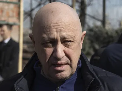 FILE - Yevgeny Prigozhin, the owner of the Wagner Group military company, arrives during a funeral ceremony at the Troyekurovskoye cemetery in Moscow, Russia, Saturday, April 8, 2023. Prigozhin is threatening to pull his troops out of the protracted battle for the eastern Ukraine city of Bakhmut next week. He accused Russia's military command Friday, May 5 of starving his forces of ammunition and rendering them unable to fight. (AP Photo, file)