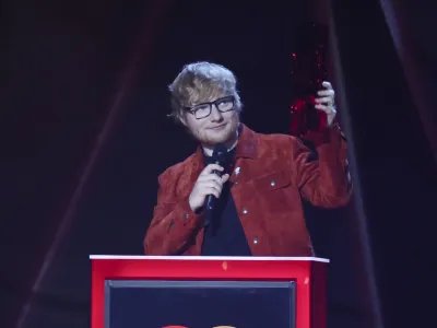 Ed Sheeran receives the Global Success Award at the Brit Awards 2018 in London, Wednesday, Feb. 21, 2018. (Photo by Joel C Ryan/Invision/AP)
