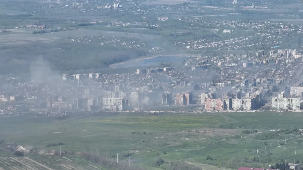 Smoke erupts following a shell explosion, amid Russia's attack on Ukraine, in Bakhmut, Donetsk region, Ukraine in this screengrab obtained from a handout video released on May 7, 2023. Adam Tactic Group/Handout via REUTERS. THIS IMAGE HAS BEEN SUPPLIED BY A THIRD PARTY