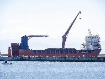 The Russian vessel, Lady R, is docked at the Simon's Town Naval Base near Cape Town, South Africa, Thursday, Dec. 8, 2022. The U.S. ambassador to South Africa has accused the country of providing weapons to Russia. Ambassador Reuben Brigety said the U.S. government was certain that weapons were loaded onto a cargo ship that docked secretly at a naval base near the city of Cape Town for three days in December. (AP Photo)