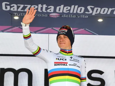 Cycling - Giro d'Italia - Stage 9 - Savignano sul Rubicone to Cesena Tudor ITT - Italy - May 14, 2023 Soudal &ndash; QuickStep's Remco Evenepoel celebrates wearing the maglia bianca jersey REUTERS/Jennifer Lorenzini