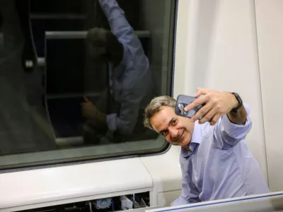 Greek Prime Minister Kyriakos Mitsotakis takes a selfie at the cockpit of a train as he visits Thessaloniki subway during its first trial run with passengers in Thessaloniki, Greece, May 18, 2023. REUTERS/Alexandros Avramidis/Pool   TPX IMAGES OF THE DAY