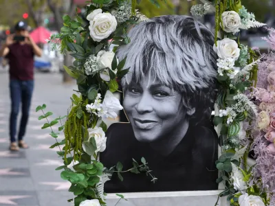 A portrait of the late singer Tina Turner stands atop her star on the Hollywood Walk of Fame, Wednesday, May 24, 2023, in Los Angeles. Turner died Tuesday at 83 after a long illness. (AP Photo/Chris Pizzello)