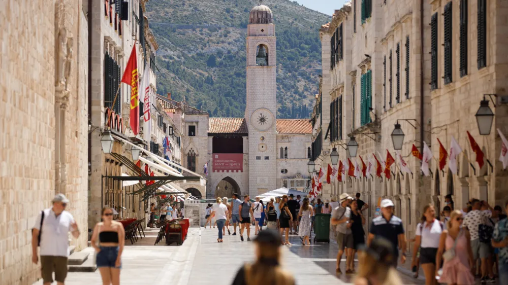 Tourists are seen at Stradun street in Dubrovnik, amid the spread of the coronavirus disease (COVID-19), Croatia, July 28, 2020. Picture taken July 28, 2020. REUTERS/Antonio Bronic