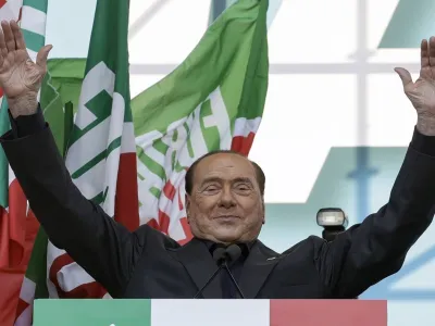 FILE - Silvio Berlusconi addresses a rally in Rome, on Oct. 19, 2019. Berlusconi, the boastful billionaire media mogul who was Italy's longest-serving premier despite scandals over his sex-fueled parties and allegations of corruption, died, according to Italian media. He was 86. (AP Photo/Andrew Medichini, File)