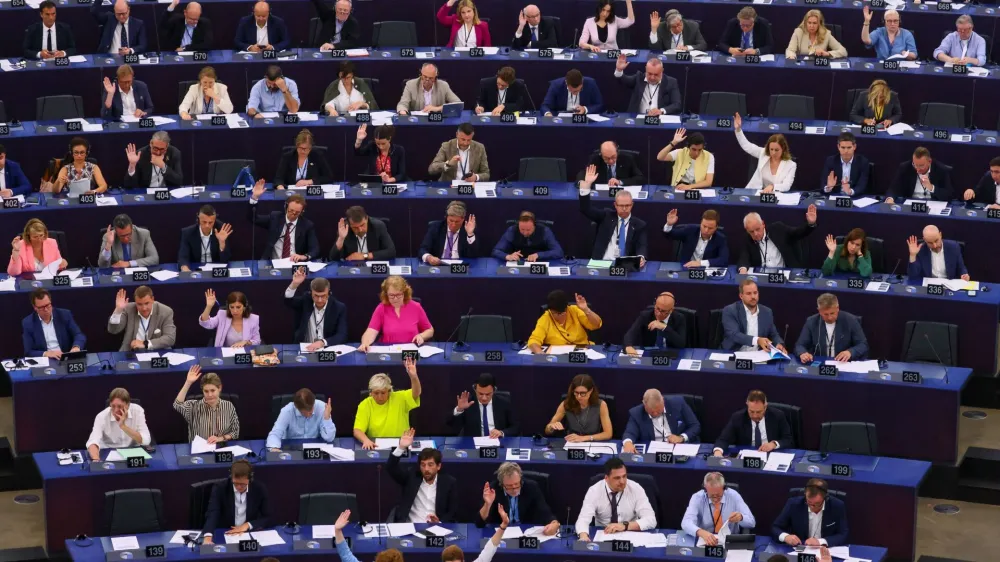 Members of the EU Parliament vote during a plenary session at the European Parliament in Starsbourg, France June 13, 2023. REUTERS/Yves Herman