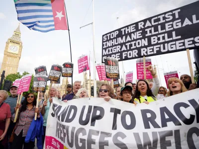 17 July 2023, United Kingdom, London: Demonstrators take part in a protest against the Illegal Migration Bill in Parliament Square, Westminster, as the bill proceeds through Parliament. Photo: James Manning/PA Wire/dpa
