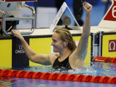 Fukuoka 2023 World Aquatics Championships - Swimming - Marine Messe Fukuoka Hall A, Fukuoka, Japan - July 23, 2023 Australia's Ariarne Titmus celebrates after winning the women's 400m freestyle final REUTERS/Issei Kato
